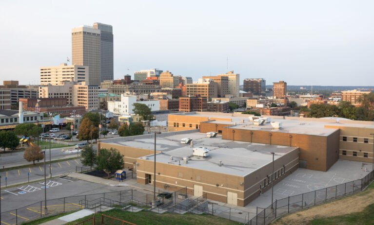Downtown City Skyline Omaha Nebraska Midwest Urban Landscape Late afternoon sunset aerial view long panoramic Omaha Nebraska