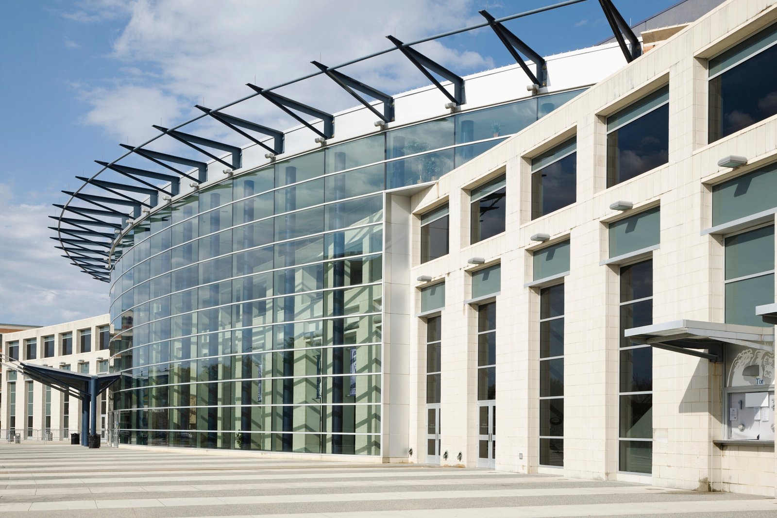 Glass Facade On Building with curved exterior and ticket booth
